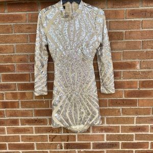 Long sleeve party dress .